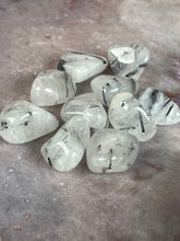 Load image into Gallery viewer, Tumbled black tourmalinated quartz
