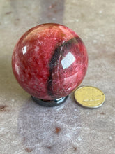 Load image into Gallery viewer, Thulite sphere - 1.6"
