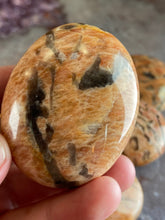 Load image into Gallery viewer, Red Graphic Feldspar palm stone
